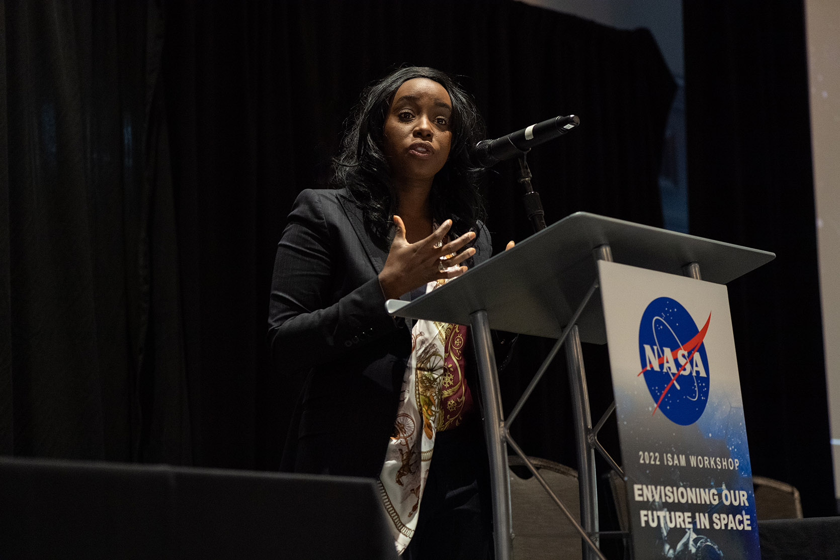 Dr. Ezinne Uzo-Okoro, assistant director for space policy, White House Office of Science and Technology Policy (OSTP), presents at the workshop