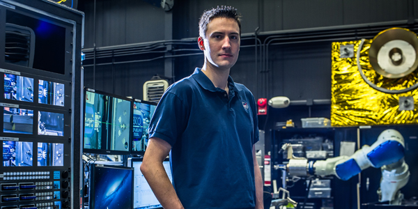 From his control center at NASA Goddard, RROxiTT lead roboticist Alex Janas will command an industrial robot approximately 800 miles away at Kennedy Space Center.